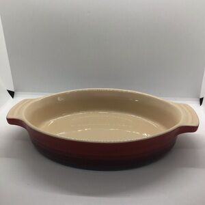 New Le Creuset Red Pottery Stoneware Oval Baking Casserole Dish 12.46 Handles.